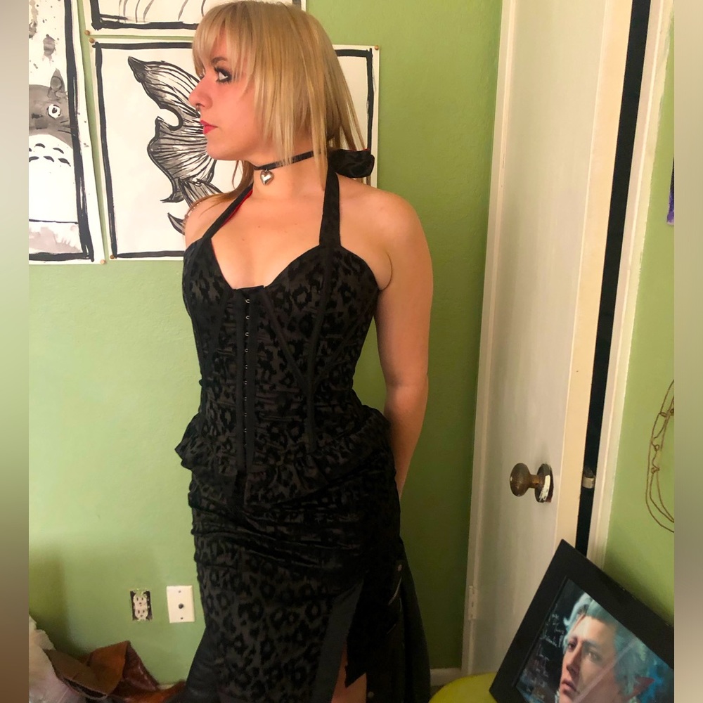 Black corset and skirt. Made by living dead souls. Worn once.